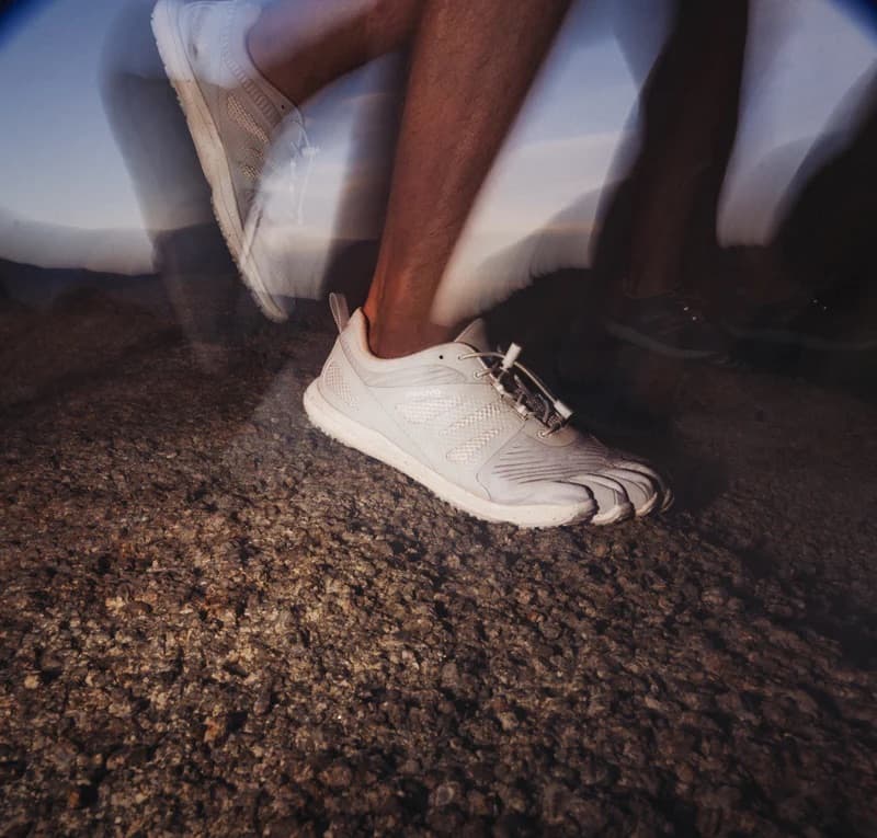 Person wearing Peluva five-toe shoes — lifestyle shot