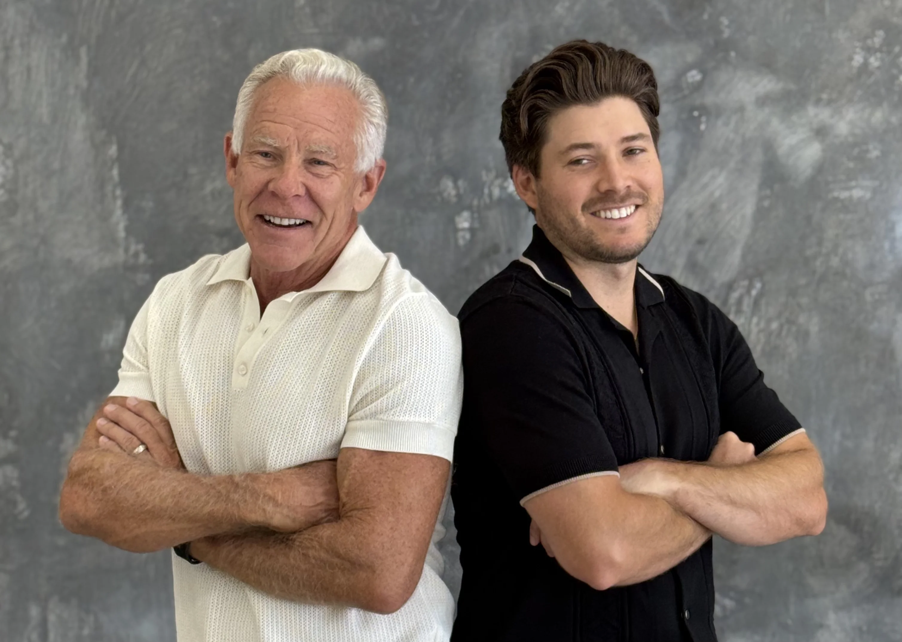 Mark and Kyle Sisson standing together, co-founders of Peluva