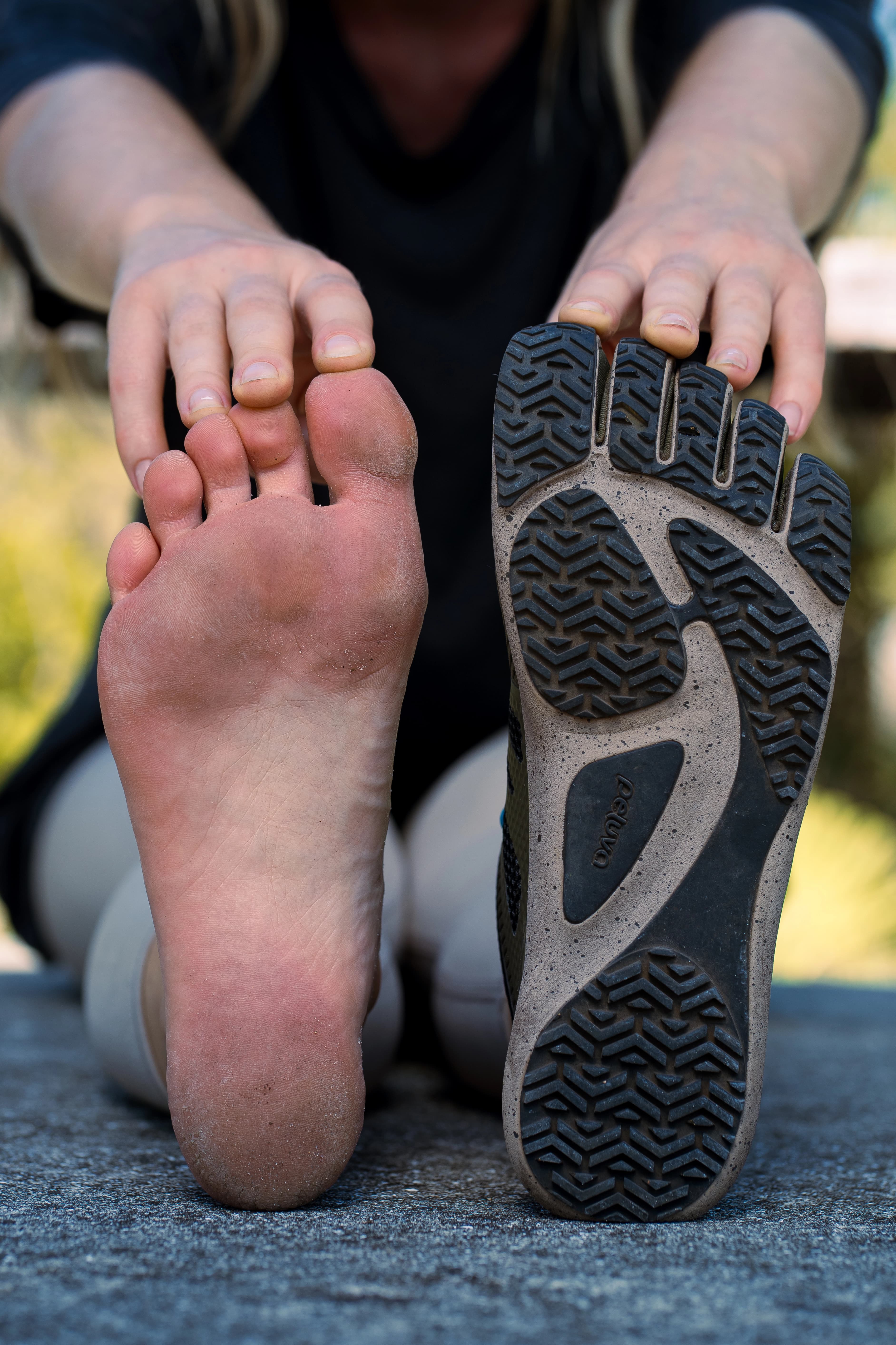 Close-up macro photo of Peluva shoe's five individual toe compartments showing anatomical contouring